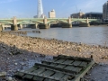 On the Thames riverbed, Shard in distance.